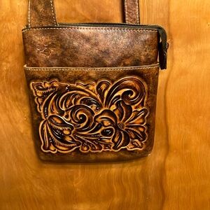 PATRICIA NASH. VERY COOL CROSSBODY. NOTICE STRAPS. BROWN. LOTS OF POCKETS. EUC